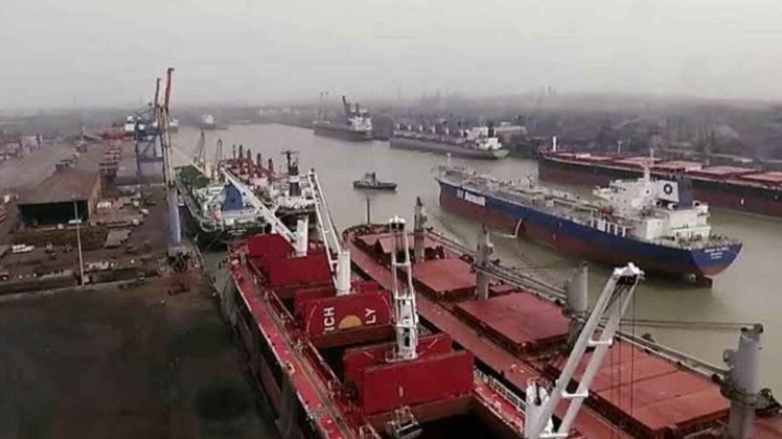Haldia Dock Complex cargo ships docked at port - Kolkata Port Trust aerial view